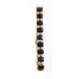 A 14ct yellow and white gold sapphire and diamond bracelet,