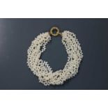 An eight row cultured freshwater pearl torsade necklace,