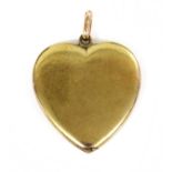 A gold heart-shaped swivel locket, c.1910,