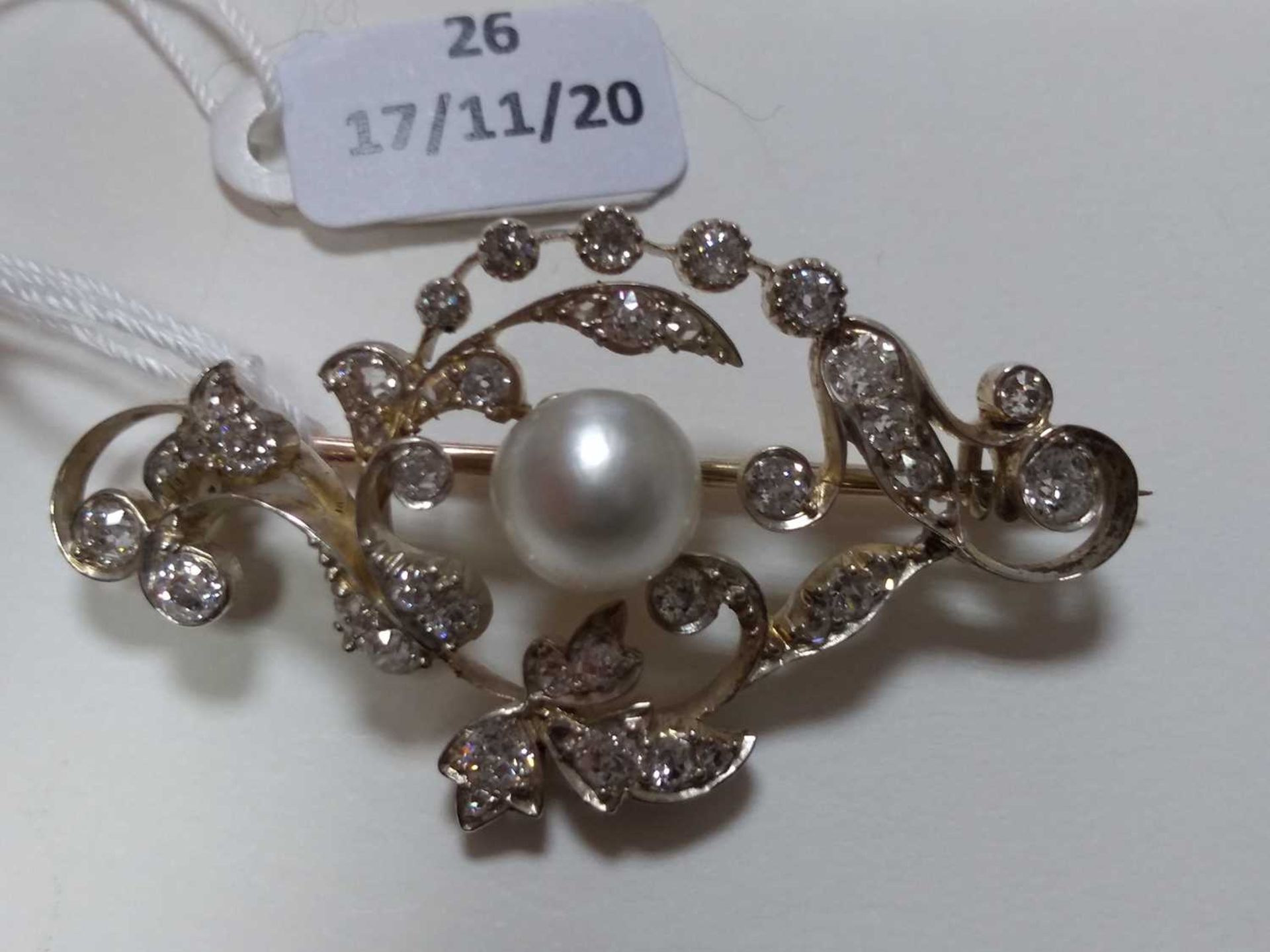 A late Victorian pearl and diamond scrolling brooch, - Image 3 of 5