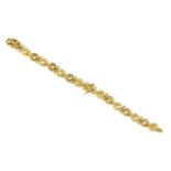 An Asian high carat gold horseshoe bracelet,