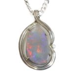 A white gold, opal and diamond pendant,