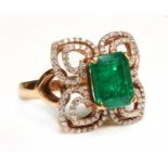 An 18ct rose gold emerald and diamond quatrefoil-shaped cluster ring,