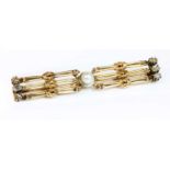 An early 20th century pearl and diamond bar brooch,