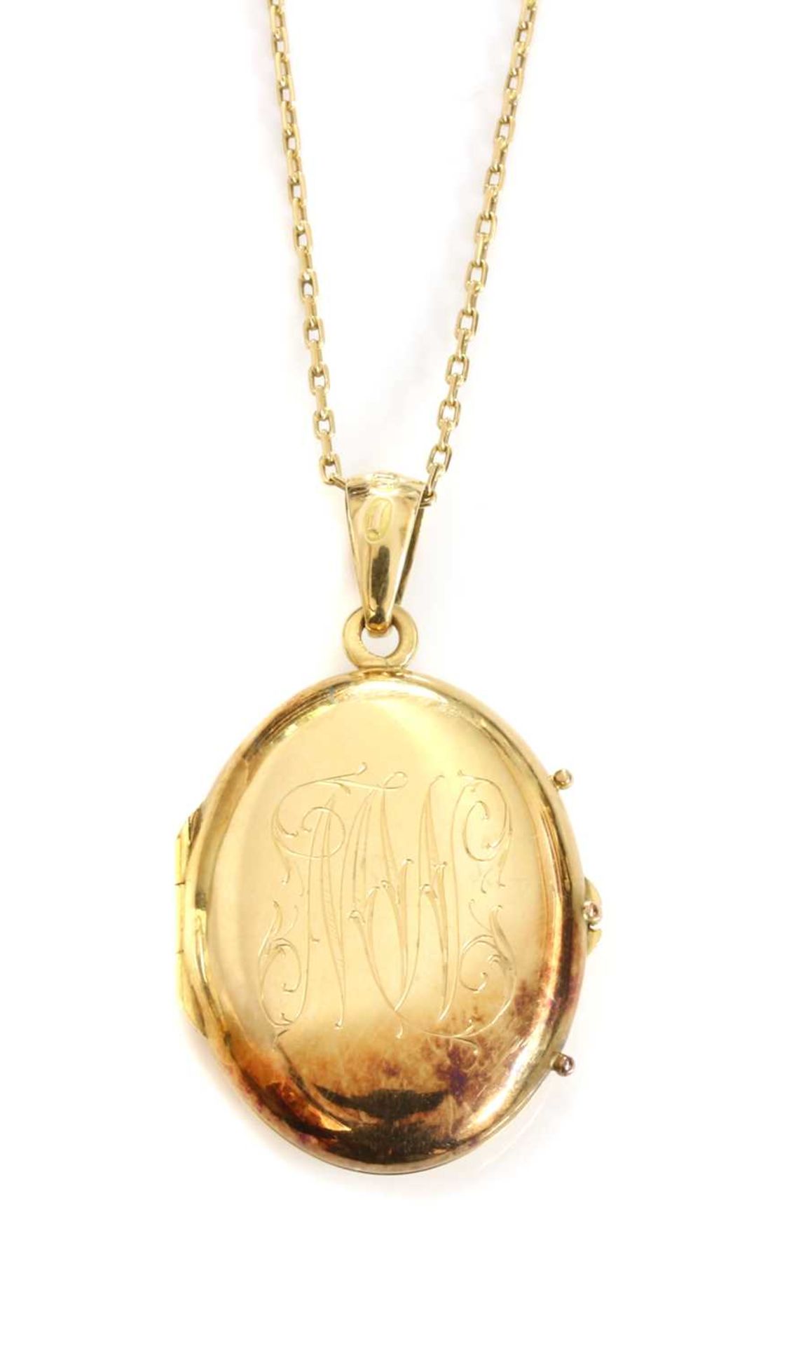 A Finnish 18ct gold oval hinged locket,