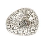 An 18ct white gold bombé ring,