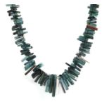 A platinum contemporary green tourmaline and diamond graduated necklace by Cox & Power,