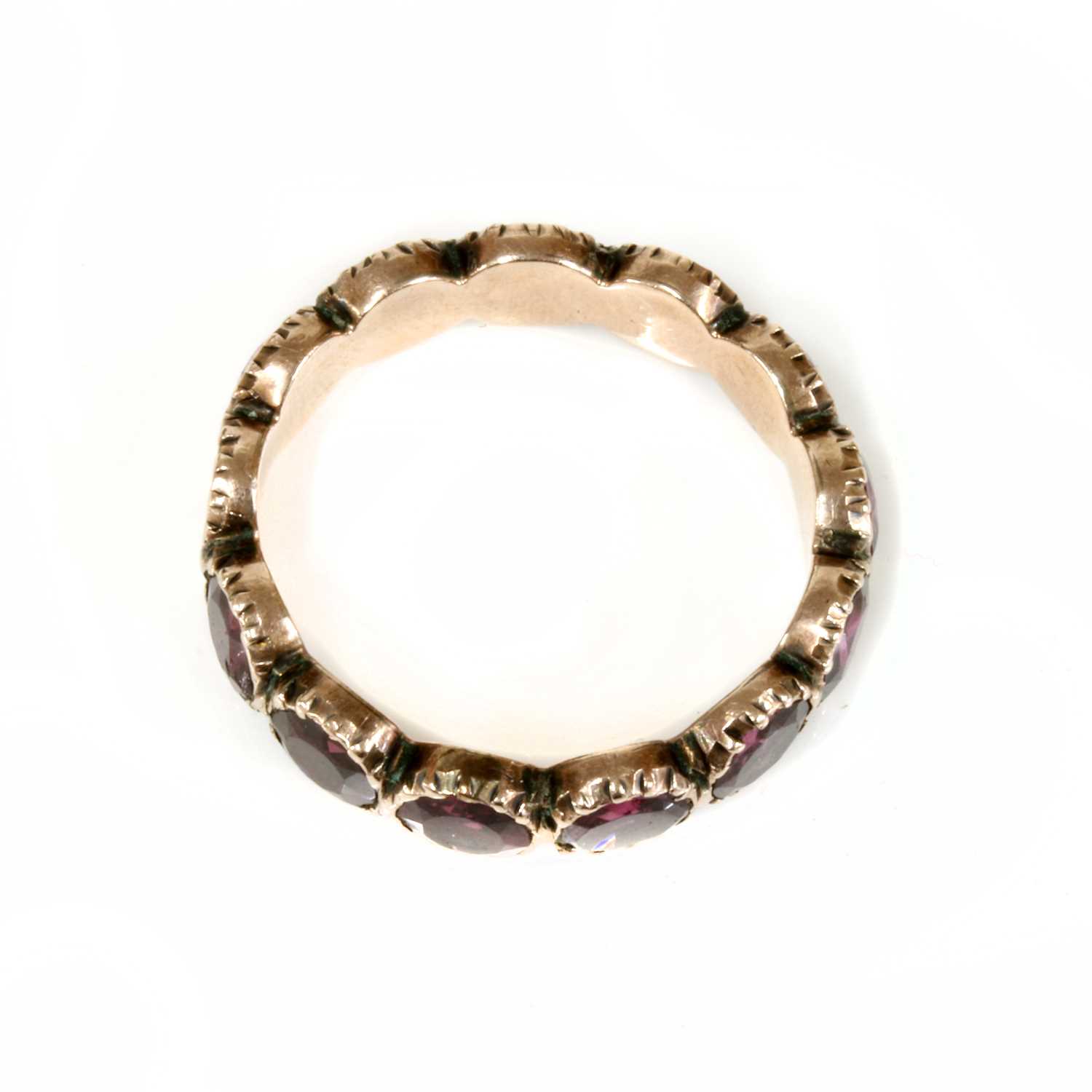 A Georgian foil-backed flat cut garnet eternity-style ring, - Image 4 of 7