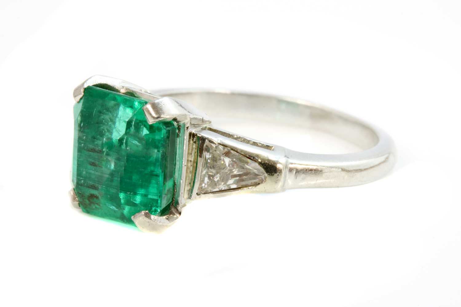 An American single stone emerald ring,
