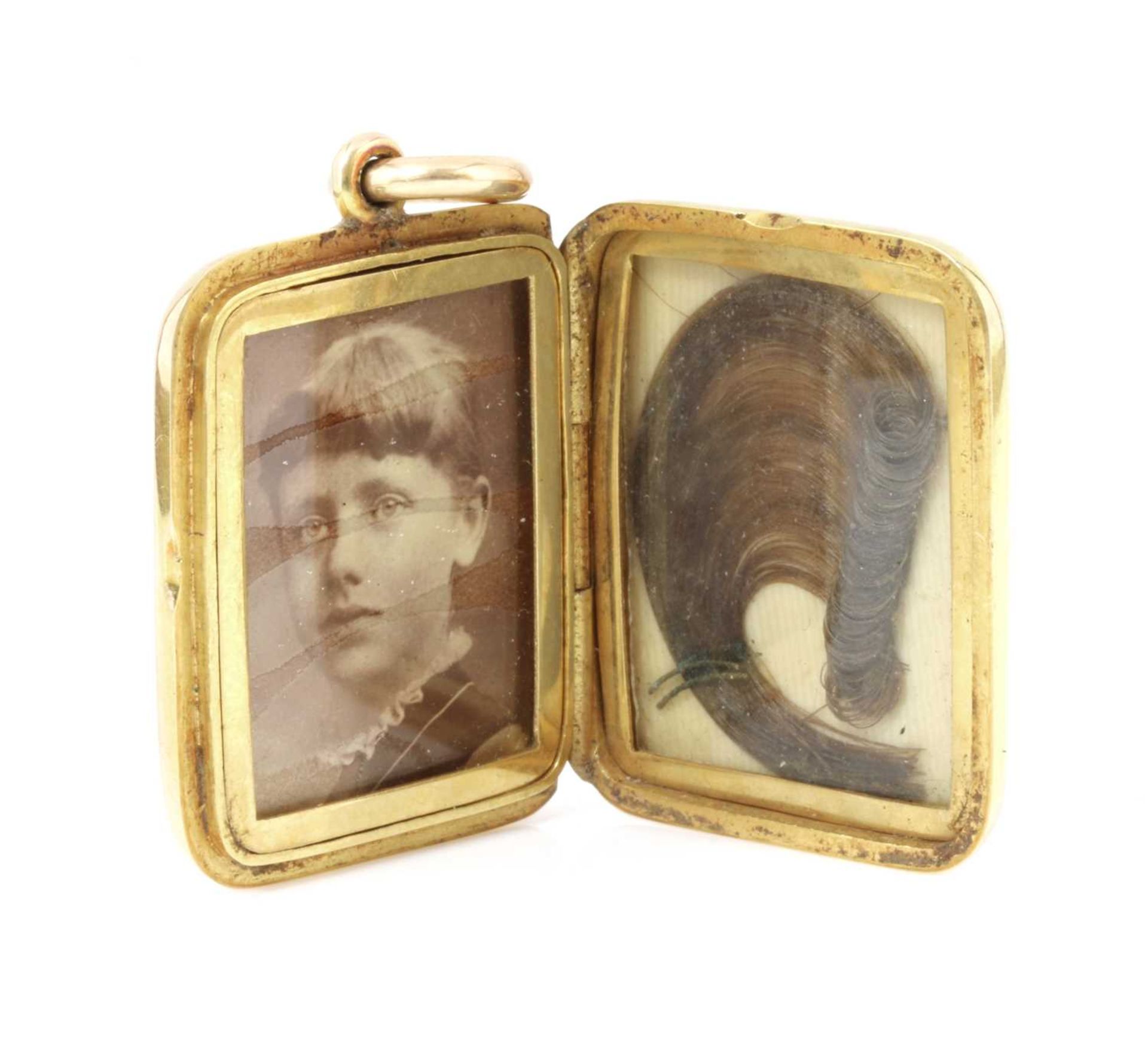 A late Victorian gold rectangular cushion-shaped hinged locket, - Image 2 of 3