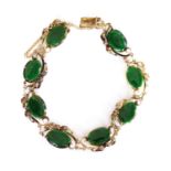 A jade bracelet, c.1950,