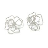 A pair of 18ct white gold diamond set ghost rose earrings,