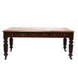 A Victorian mahogany and leather topped library table,