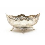 A silver bread basket of oval form,