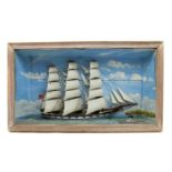 A diorama of a three masted sailing ship,