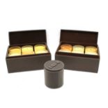 Four leather boxed sets of scented candles, a leather cased single candle and a tidy box (6)
