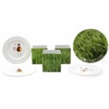 A set of six Grass patter plates,