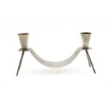 A Scandinavian stainless steel candelabra,