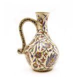 An Iznik pottery jug,