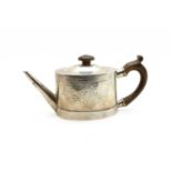 A George III silver teapot of ovoid form,