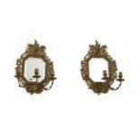 A pair of rococo-style gilt brass girandoles,