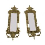 A pair of gilt brass girandoles,