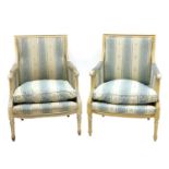 A pair of painted armchairs,