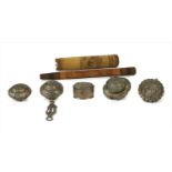 Five Indian silver tobacco pouches,