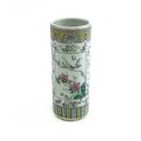 A Chinese porcelain vase or stick stand,