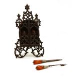 A carved hardwood ecclesiastical travelling icon case,