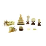 A collection of jade and soapstone,