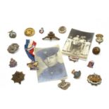 A box of military and other badges