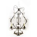 A bronze lyre shaped table lustre,
