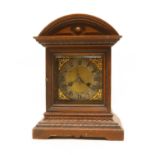 An early 20th century Junghans oak cased eight day mantel clock,