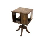 An Edwardian mahogany inlaid revolving book table,