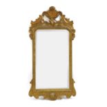 A George I giltwood pier mirror,