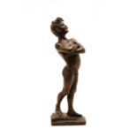 G Reno, a small bronze figure of a boy,