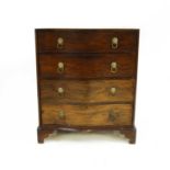 A Bengal rosewood 'Sheesham wood' serpentine chest of drawers,