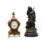 A French boulle mantel clock and a spelter figure
