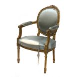 A gilt wood armchair,