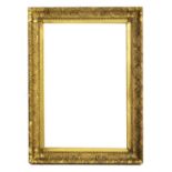 A large 19th Century gilt frame with acorn corners and ribbon decoration