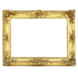 An ornate 19th Century gilt frame,