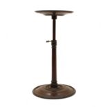 A small 19th century mahogany adjustable candlestick stand