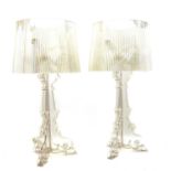 A pair of Lucite table lamps and shades,