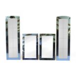 A set of four Art Deco blue and clear glass frameless mirrors,