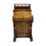 A Victorian walnut Davenport