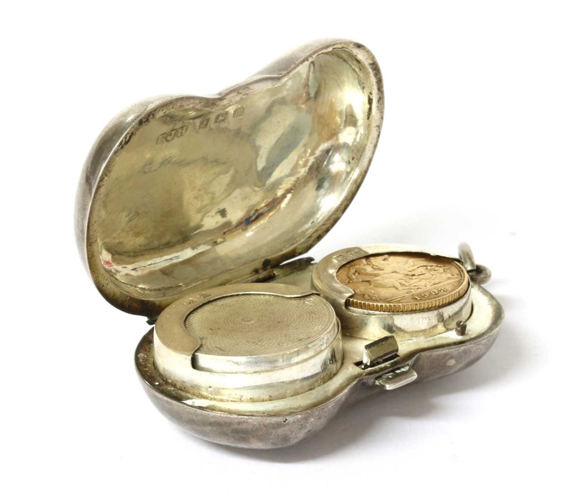 A sterling silver kidney-shaped twin section sovereign holder, - Image 2 of 2