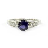 A platinum iolite and diamond ring,