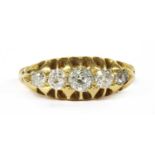 An Edwardian 18ct gold five stone diamond ring,