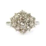 An 18ct white gold diamond oval cluster ring,
